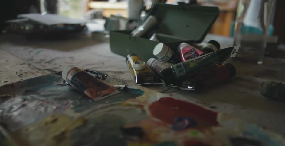 Tubes of paint lying on a table