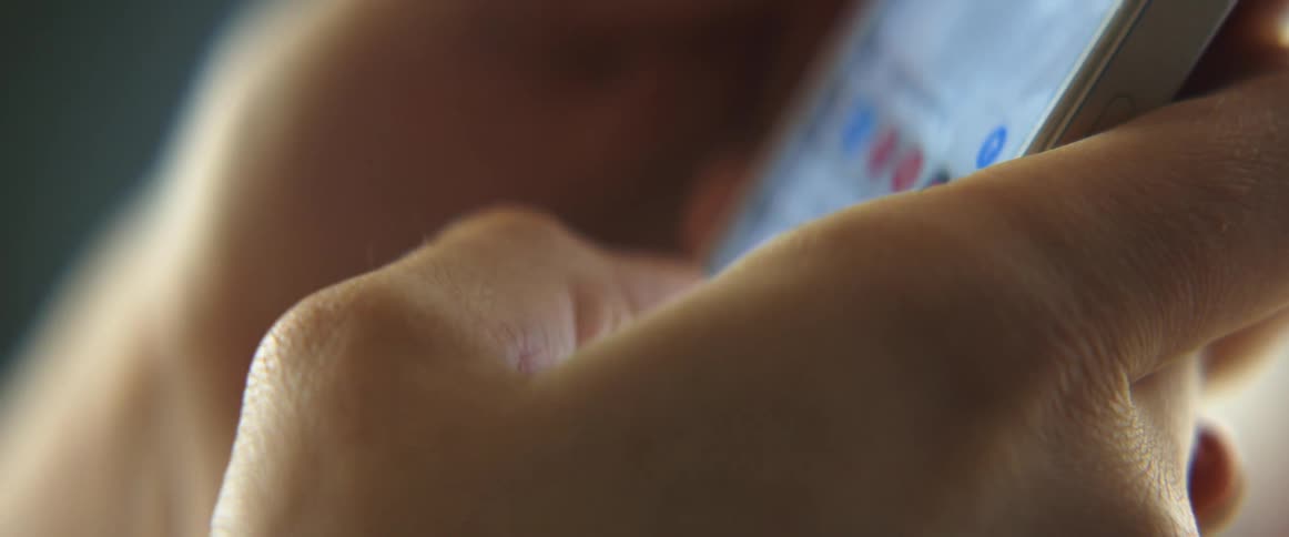 A person uses a cell phone