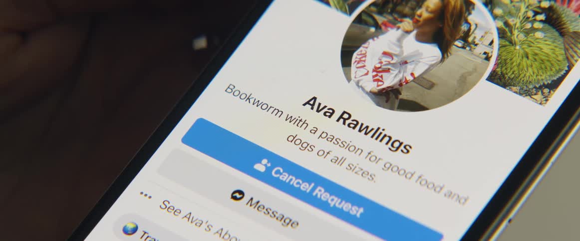 A person sends a friend request to a woman on their phone