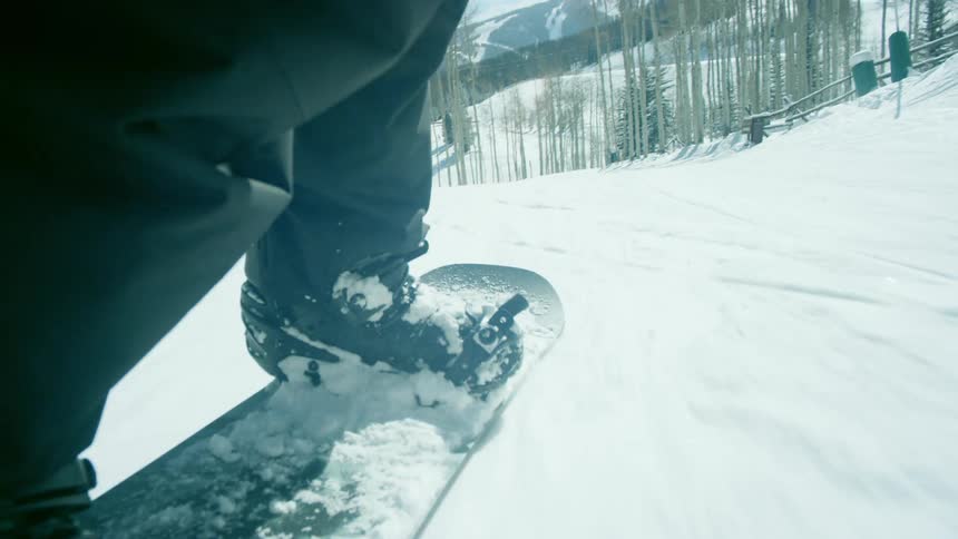 A person snowboarding down a mountain