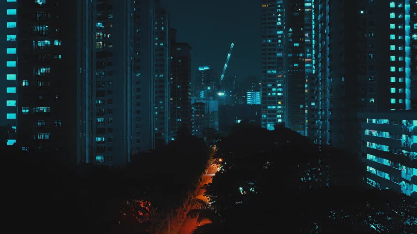 Condo and office lights and heavy traffic light up downtown at night
