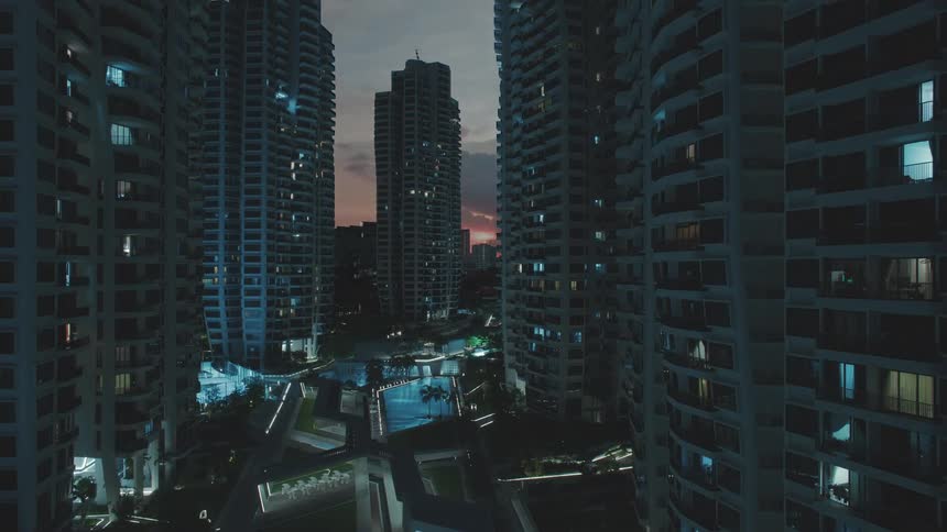 Time lapse of construction crews putting up apartment buildings in a city