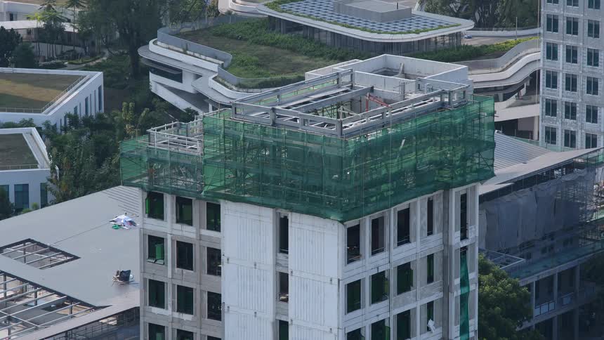 Time lapse of a construction crew working on a high rise building