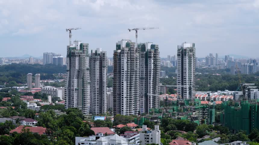 Time lapse of construction of skyscrapers in a city