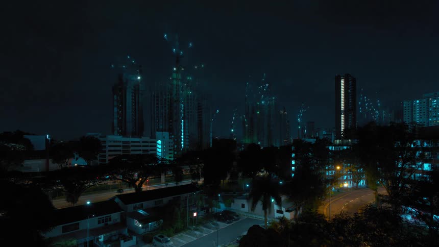 A time lapse of a city growing at night with traffic in the foreground