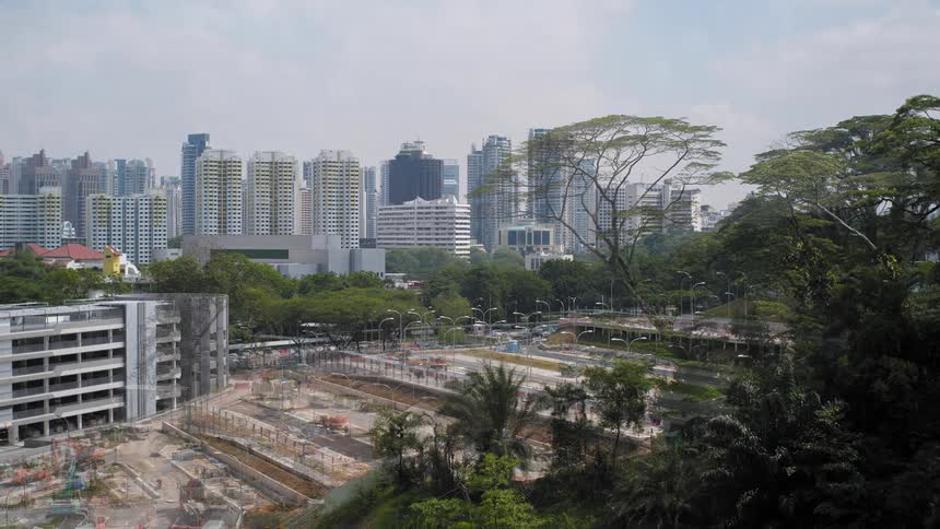 A time lapse shows a construction site transform into a tiered parking site