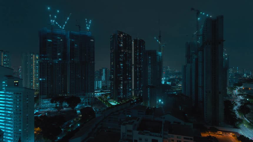 Cars travel on the roads of the city at night