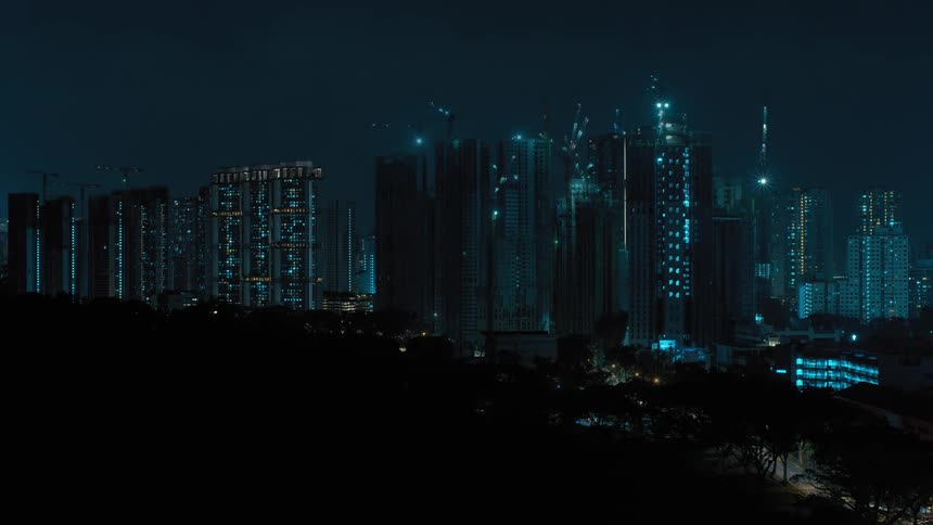 The lights flash on the sides of the buildings