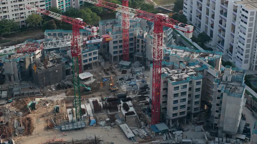 Time lapse of a construction crew building a high rise in a city