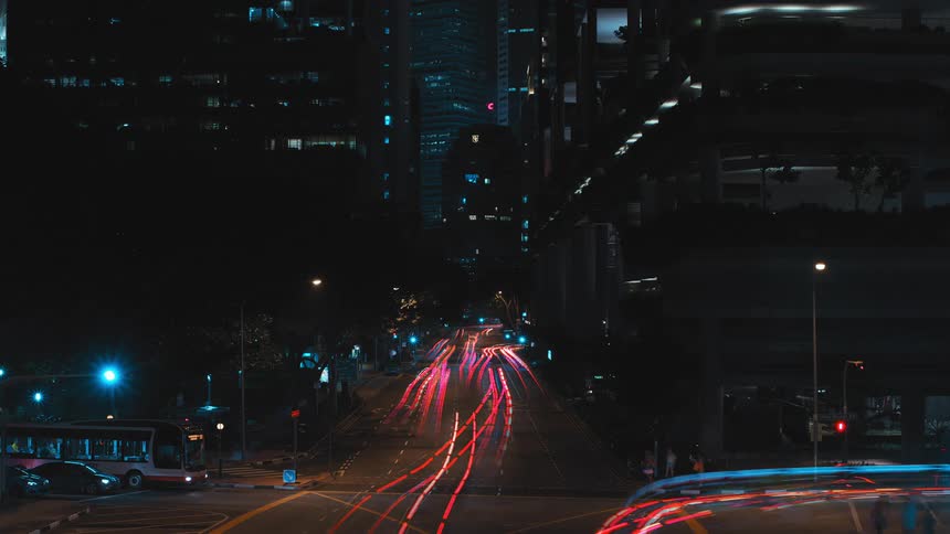 A city with streets buildings vehicles and pedestrians