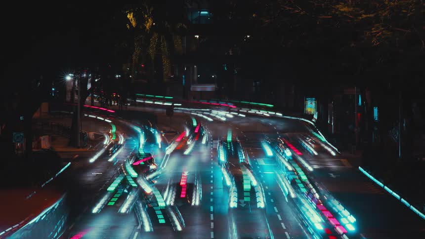 The roads are full of vehicles traveling at night