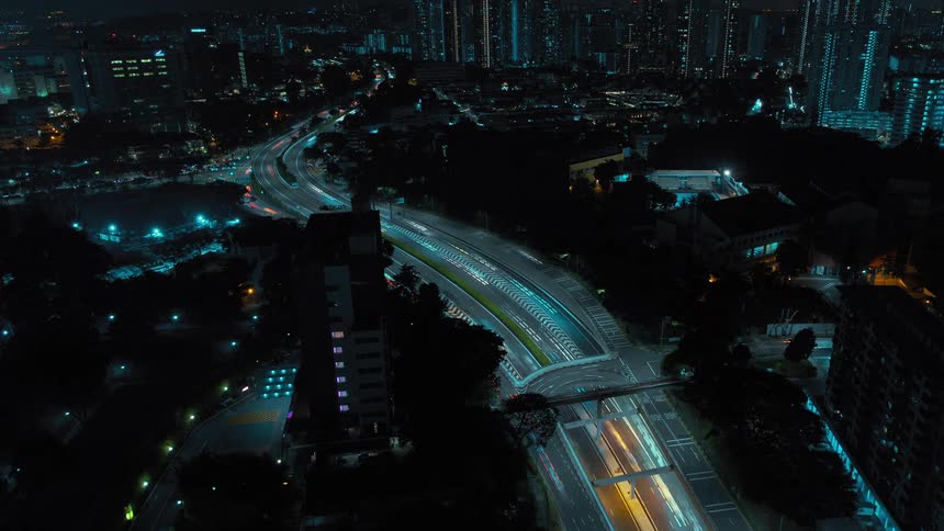 There is heavy traffic on the road by the city