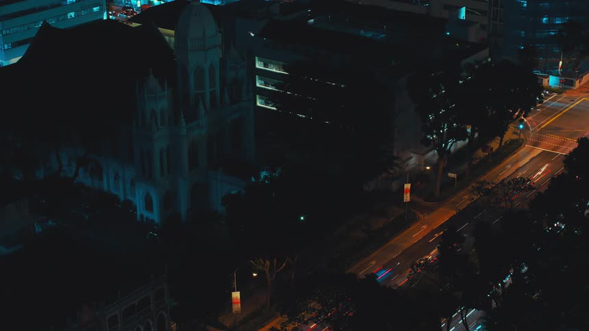 The busy street is full of traveling cars at night