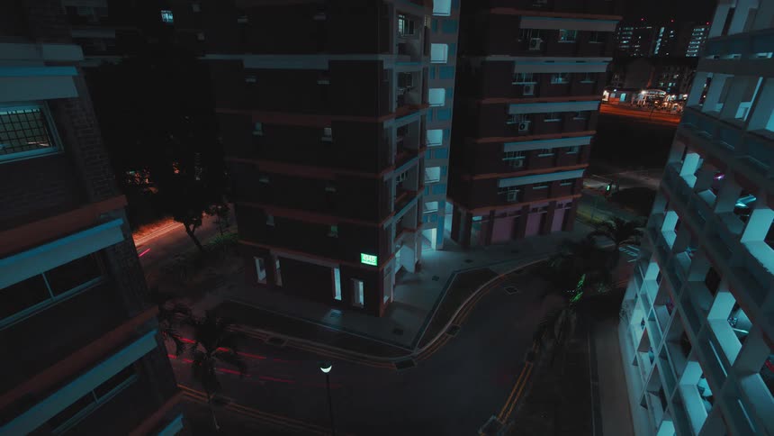 A city with buildings vehicles streets and trees