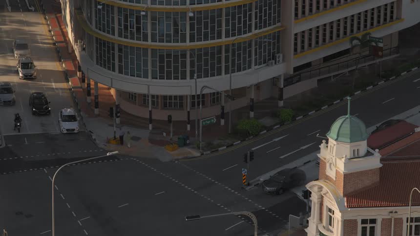 A city with streets buildings vehicles and pedestrians