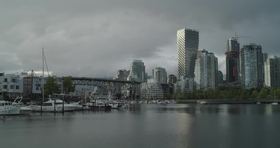 A time lapse Vancouver House and Granville Bridge during sunset