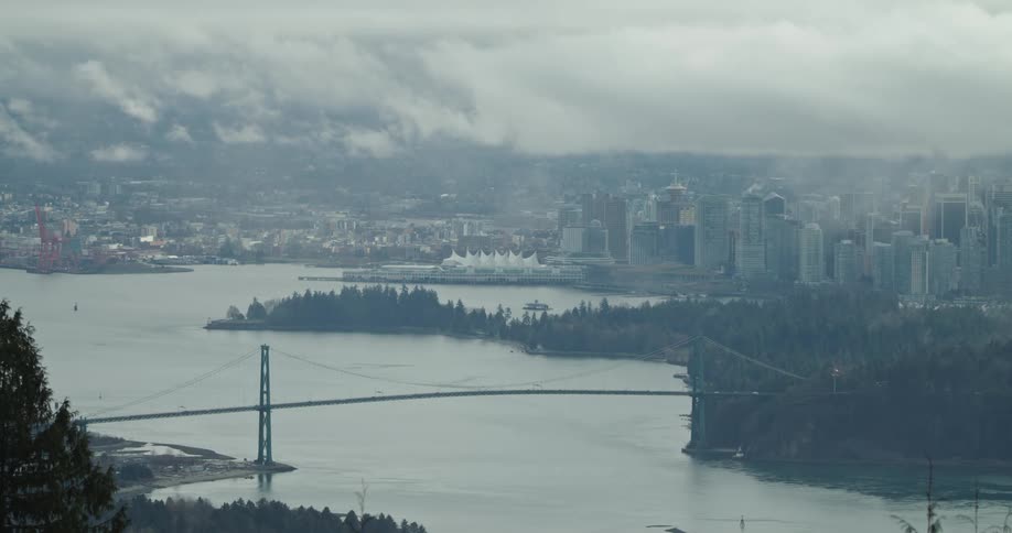 A view of clouds over Stanley Park and Lion's Gate Bridge