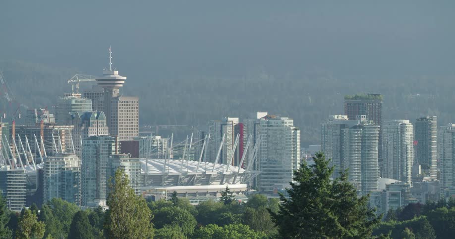 BC Place stadium is situated amidst multiple tall buildings and skyscrapers downtown