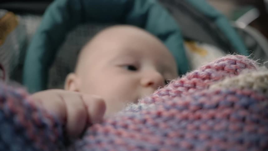 A baby in a blanket