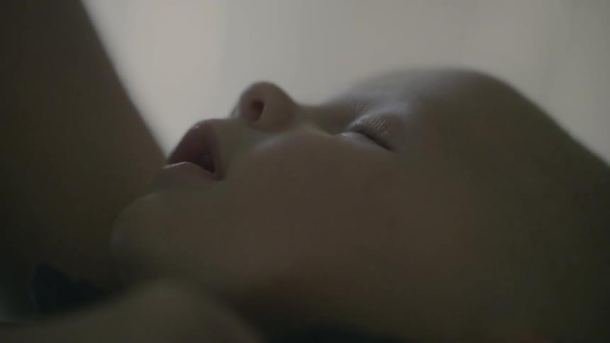 A baby sleeps with his mouth open