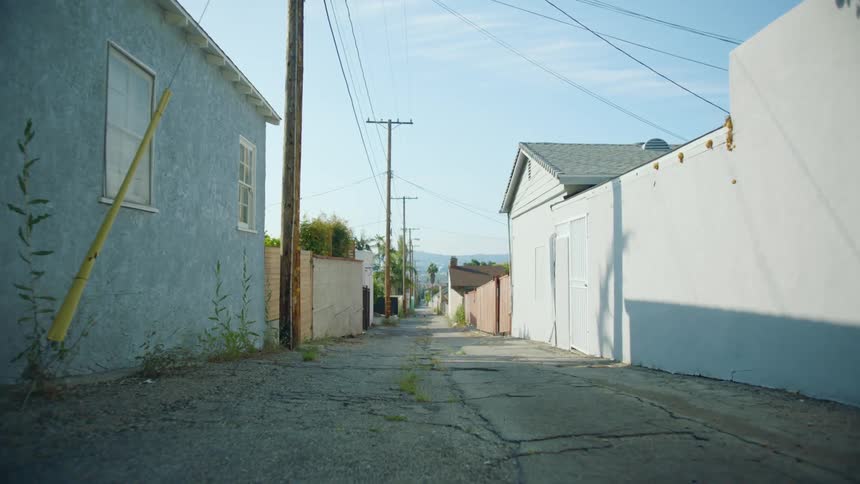 A view of houses from a road in a neighborhood