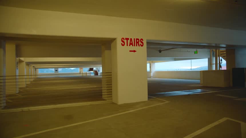 Carpark with stairs sign