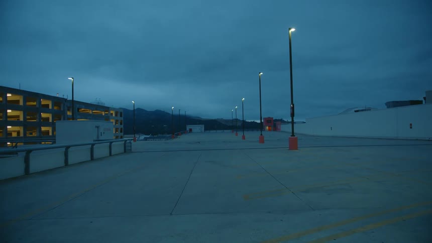 A shot of a parking garage at night