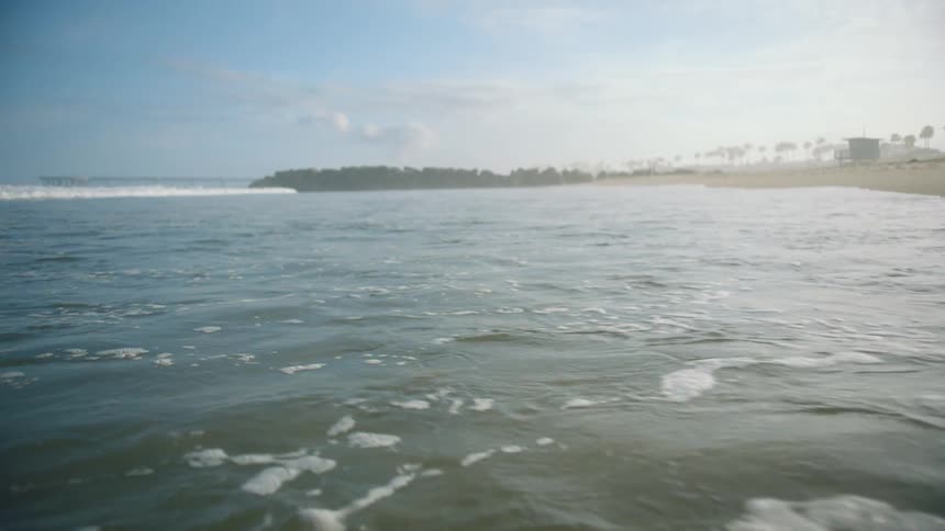 A view of waves at the beach