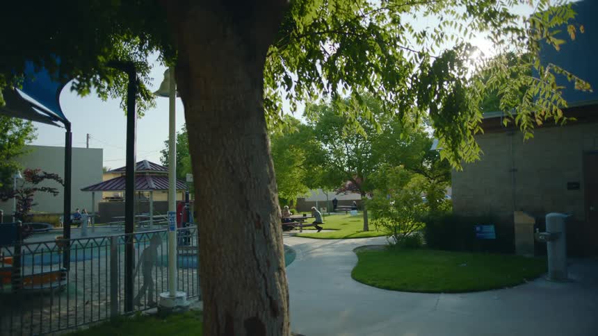 A park is empty in the spring at dusk