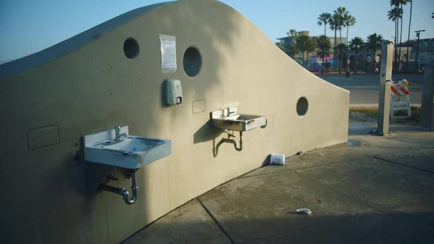 A view of sinks that are outdoors at a park