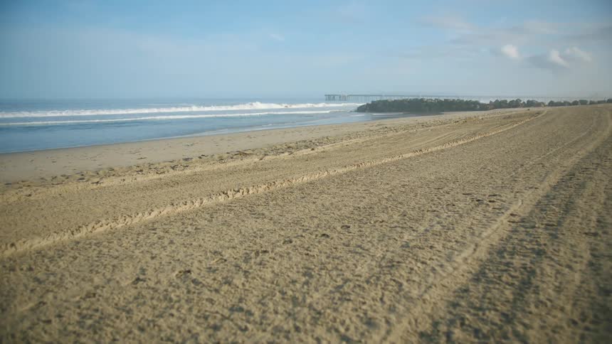 A view of the beach and the ocean