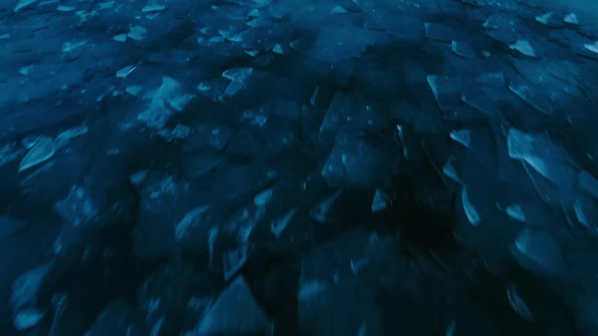 Chunks of ice float in the lake