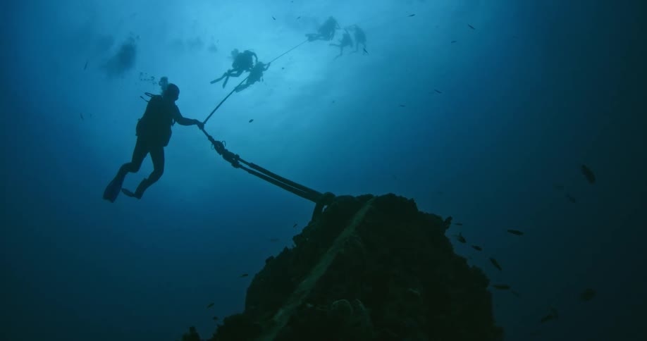 Person swims under water