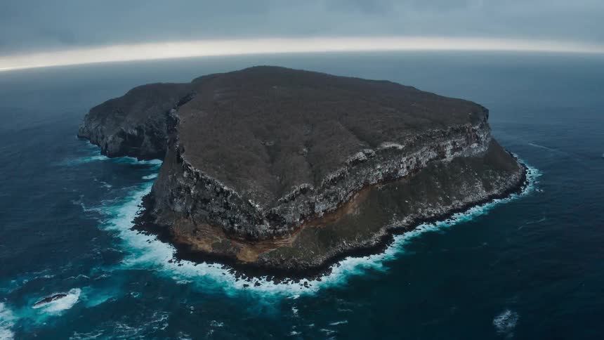 Large rock sits in the ocean