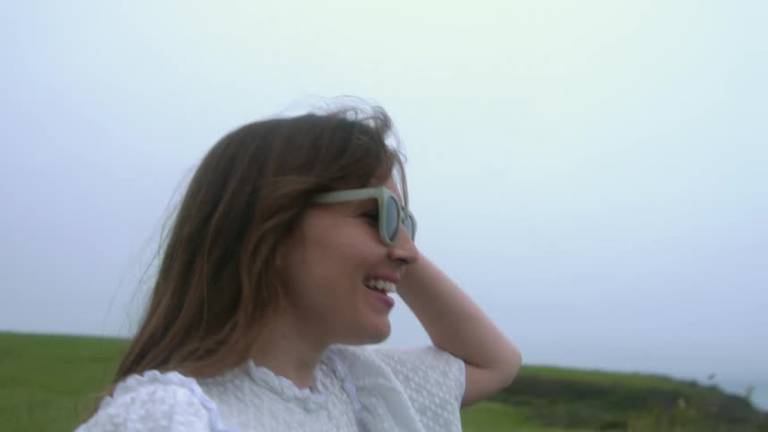 Woman smiling outdoors