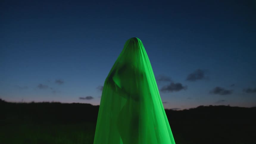 Woman covered by cloth