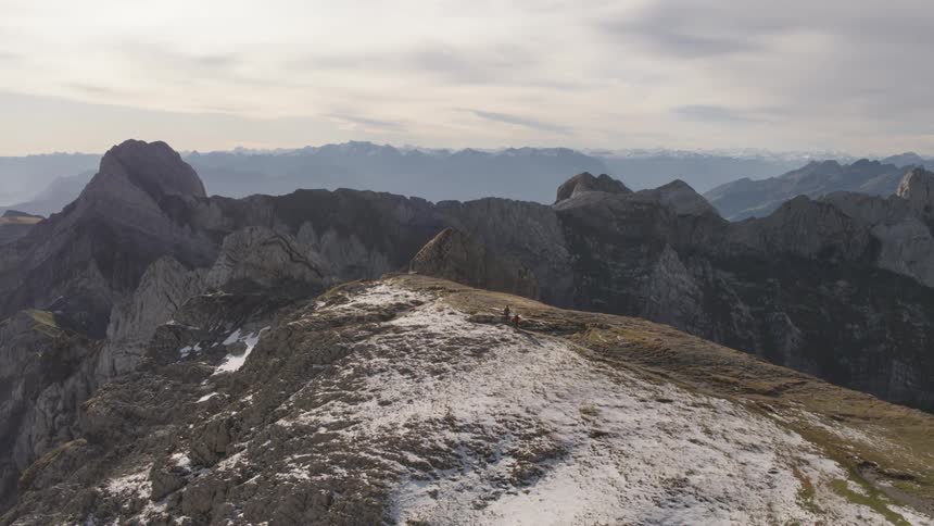 Snow covers some of the mountain