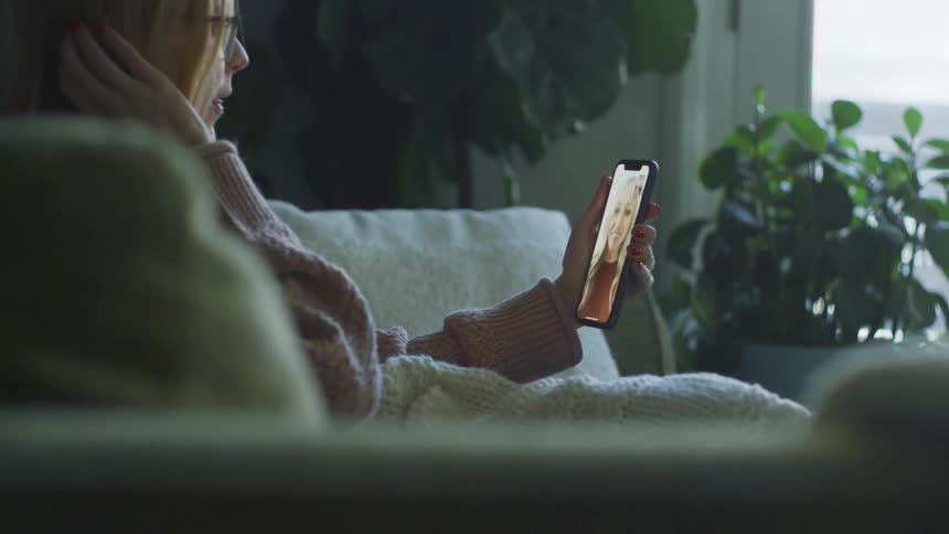 Two women talking via video call