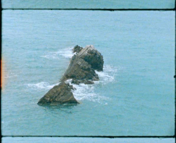 Waves crashing against rocks