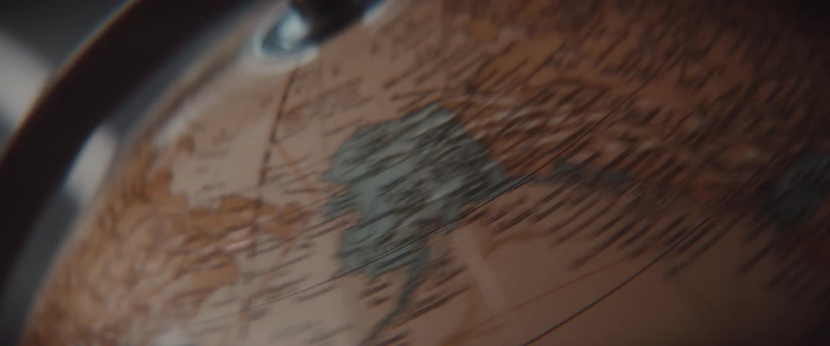 A spinning globe comes to a stop