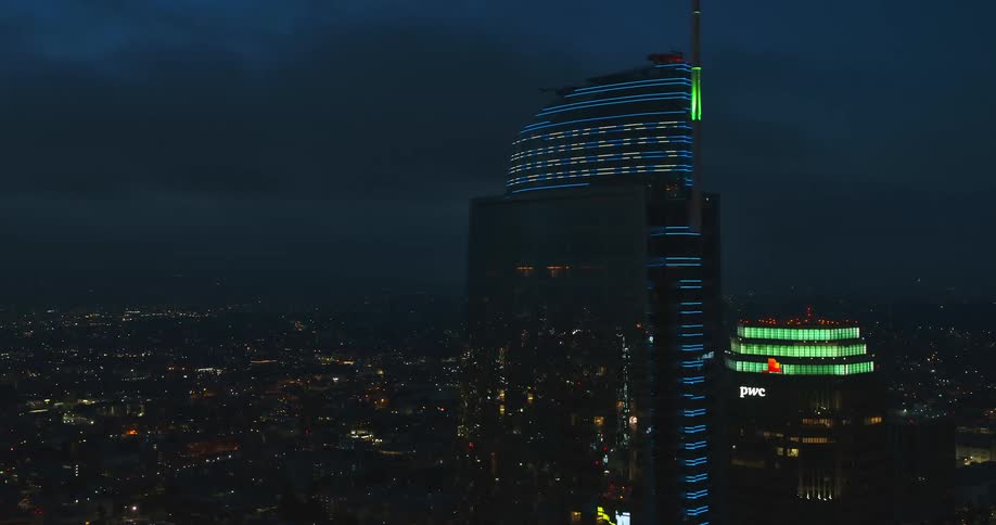Lights flashing on a high rise building in a city