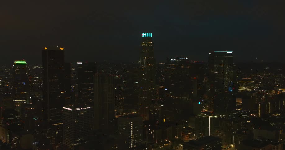 Aerial view of illuminated high rise buildings in the city at night