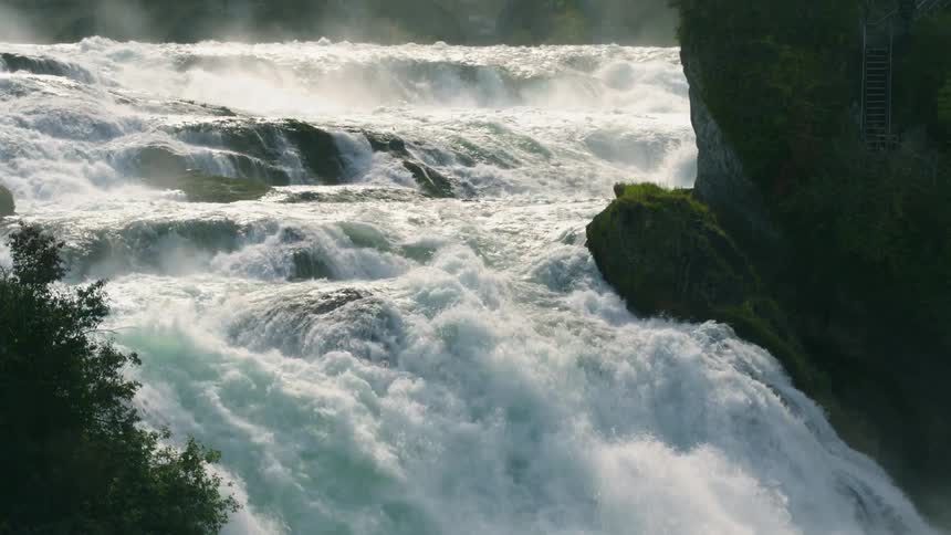 Water gushing over rapids in nature