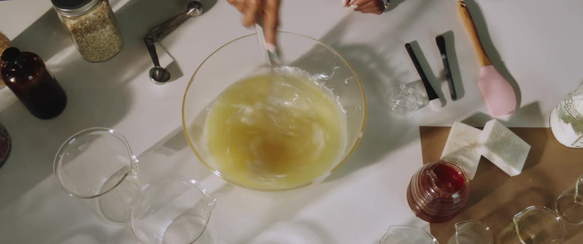 A person is preparing food on a table indoors