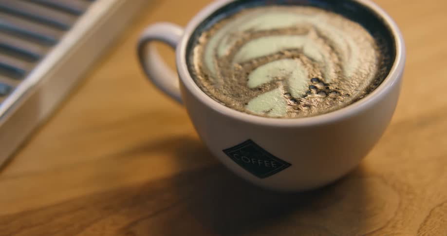 Someone placing coffee