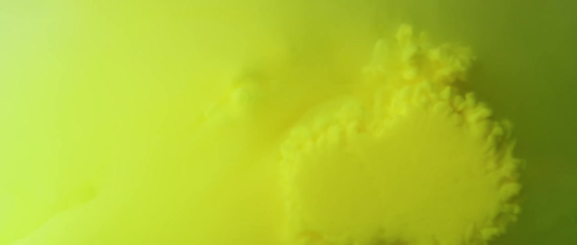 Green smoke that is collapsing