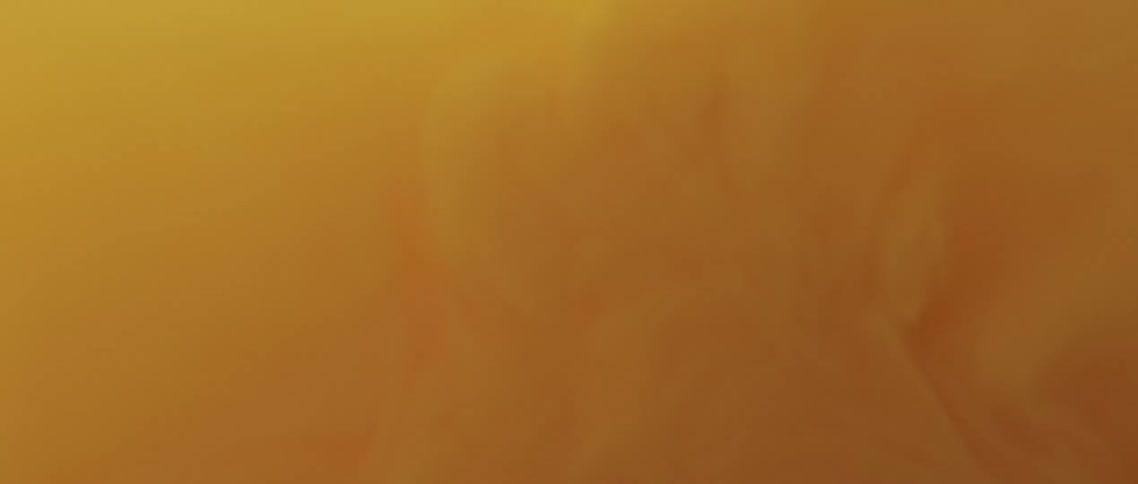 Yellow white and brown colors that look like paint and water
