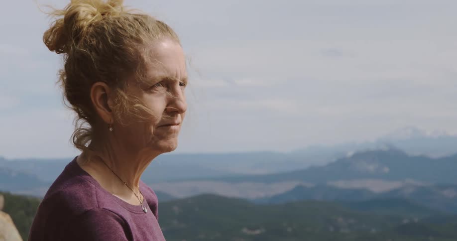 A portrait of a woman looking into the distance