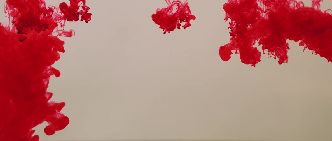 Red pink and white colors that look like paint and water