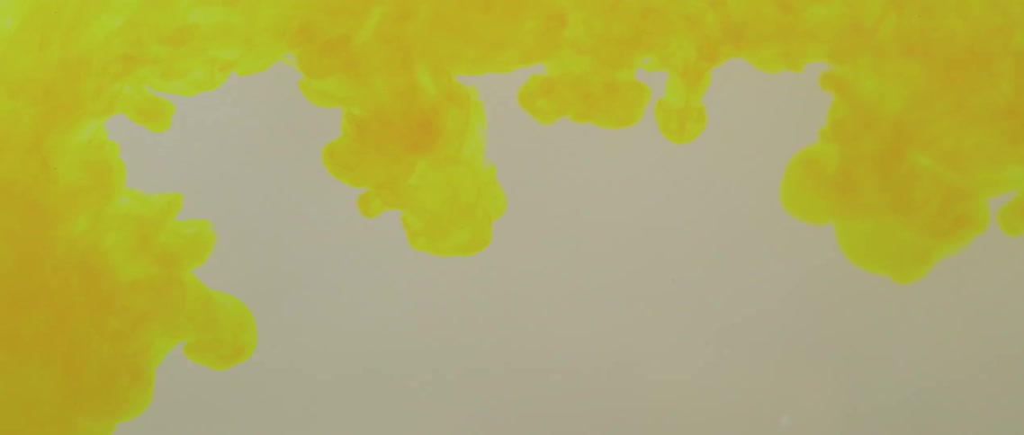 Yellow white and brown colors that look like paint and water